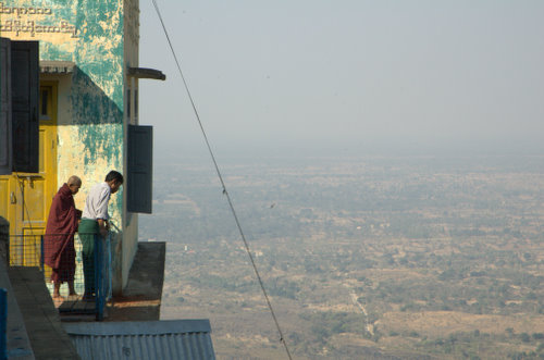 Monk and Man Looking Down The Mountain, Mount Popa, Myanmar